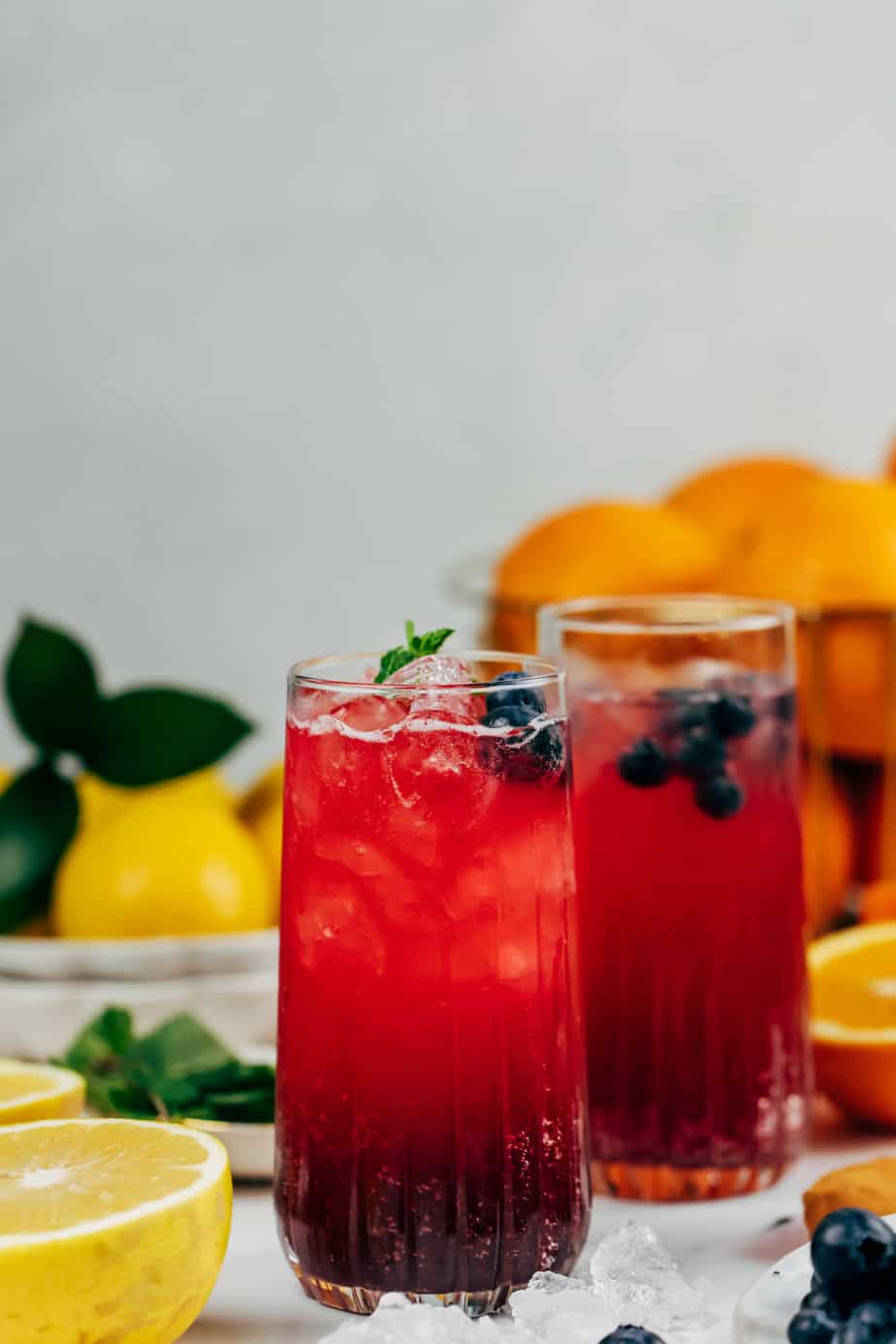 A refreshing gin cocktail made with a fresh blueberry syrup, a kick of gin, and topped with sparkling soda water. 
