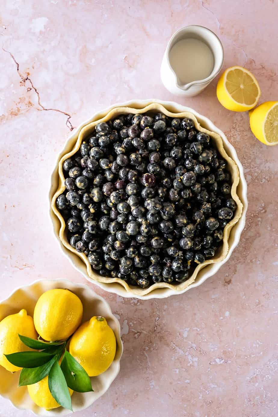 A pie filled with blueberries