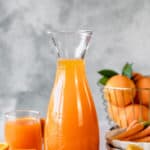 carrot and orange juice in a pitcher
