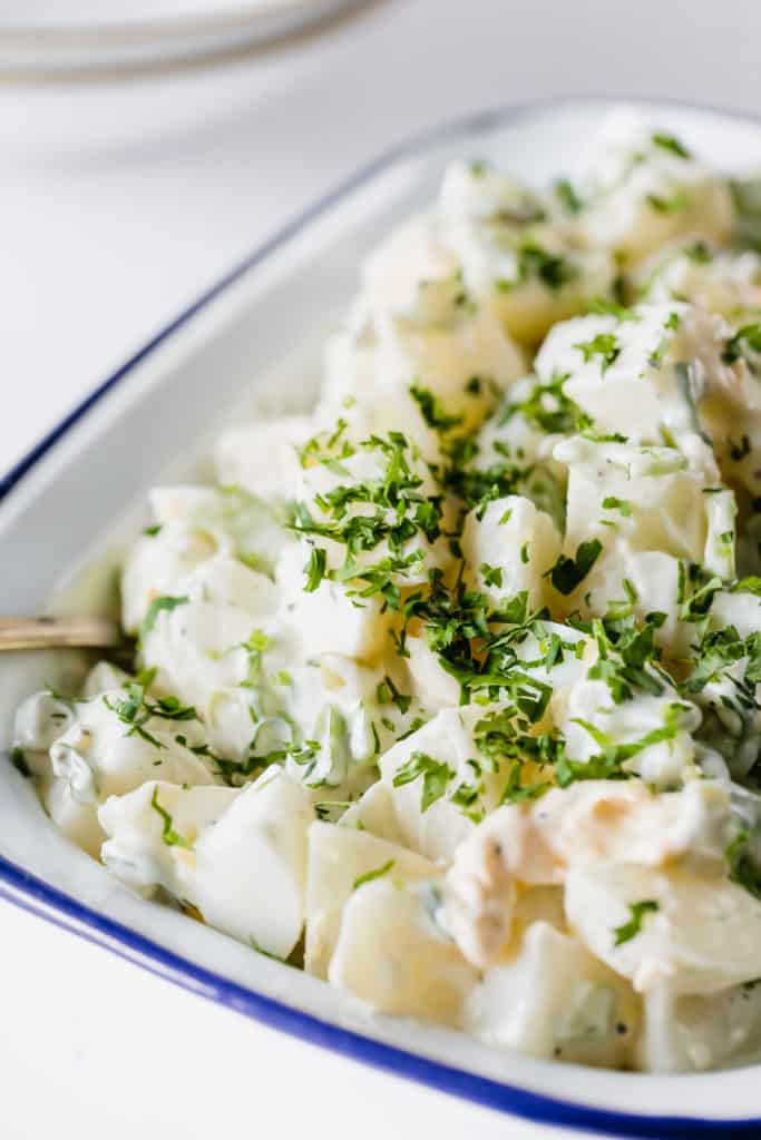 Classic potato salad in enamel dish