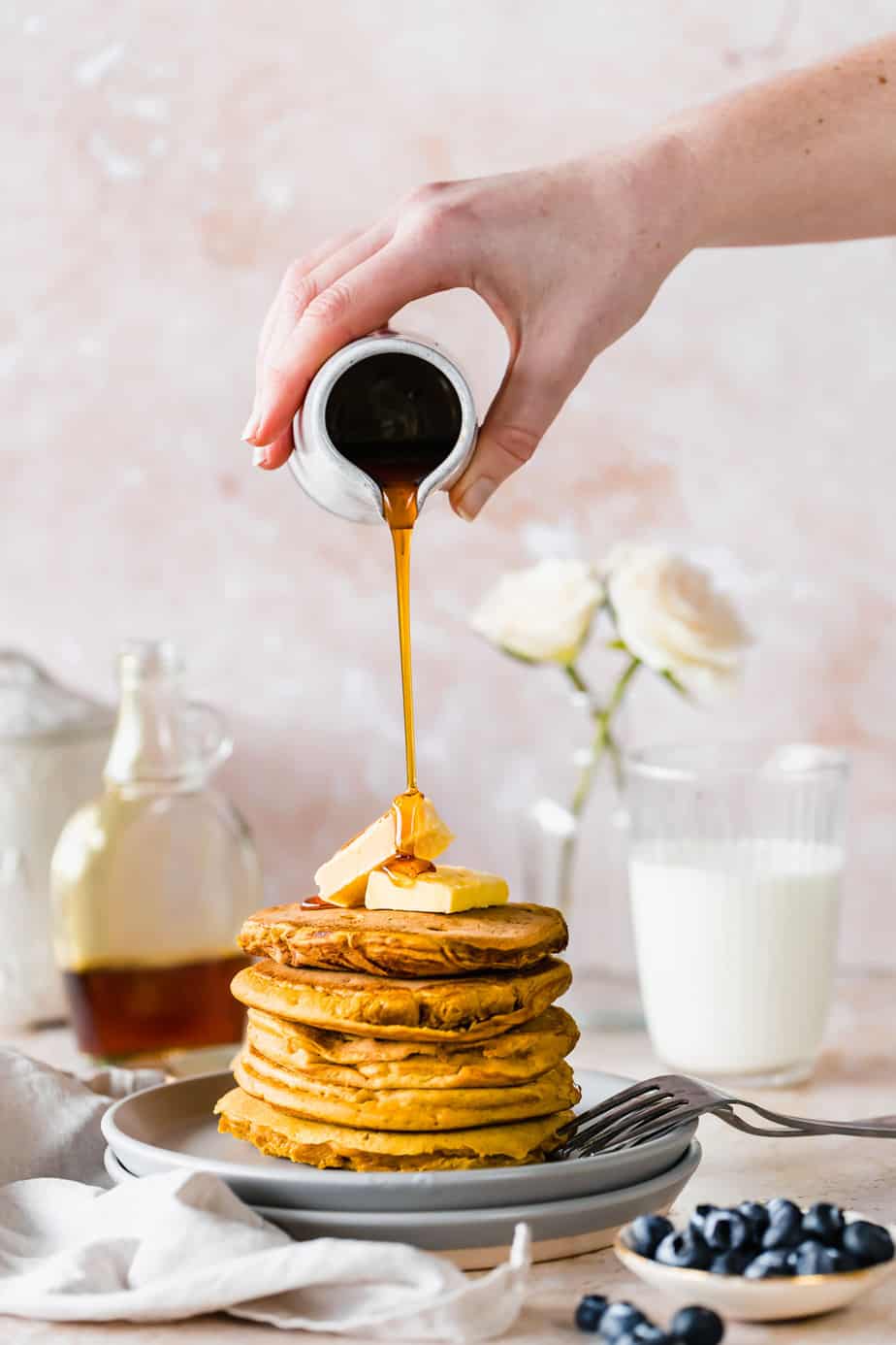 Fluffy Pumpkin Pancakes or Hotcakes with maple syrup