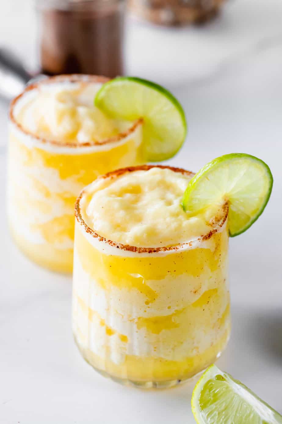 Pineapple margaritas with a spicy chili salt rim