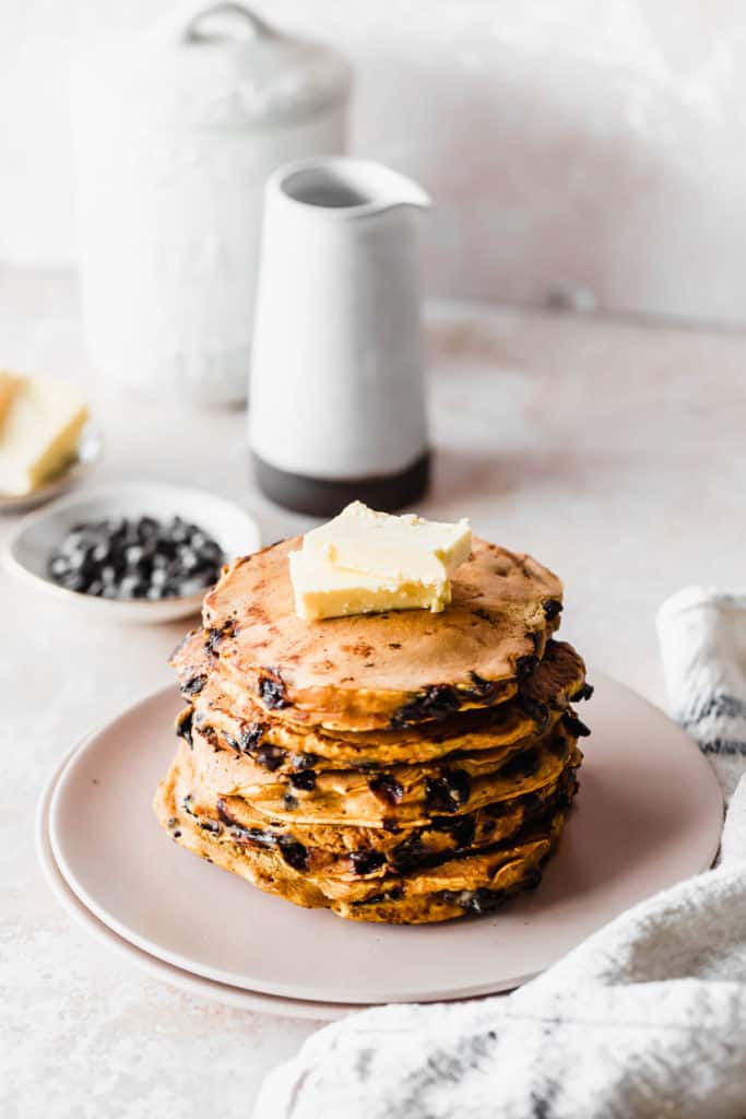 stack of oat milk pancakes with butter