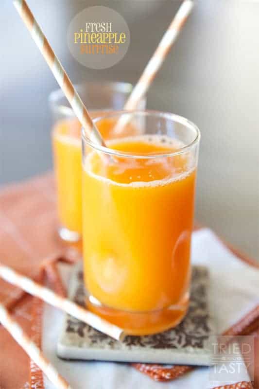 fresh juice in two glasses with straws