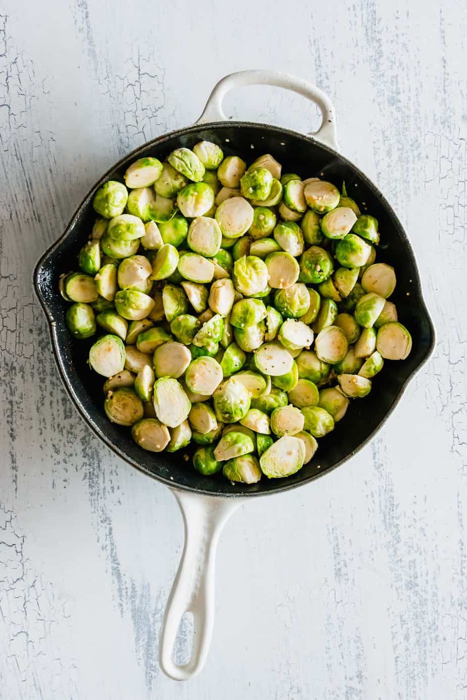 Brussels sprouts in a skillet.