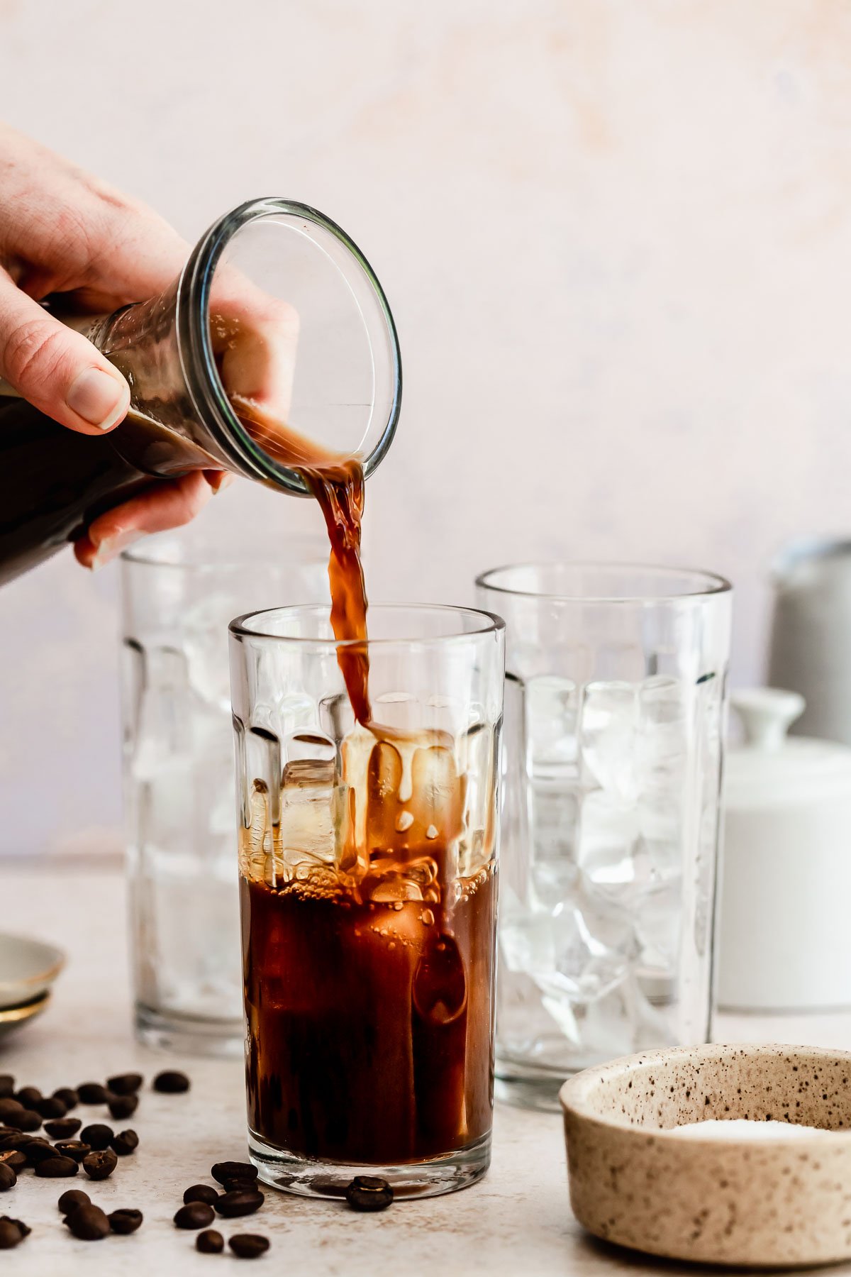 Coffee pouring into glasses.