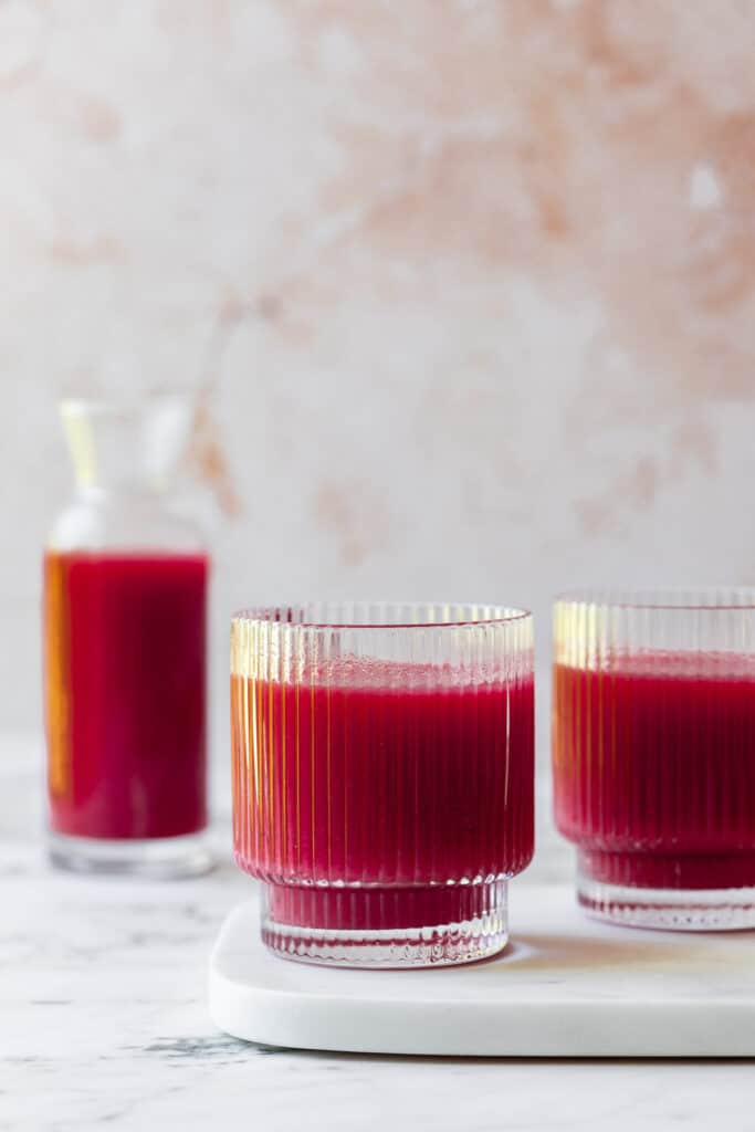 carrot and beetroot juice on marble