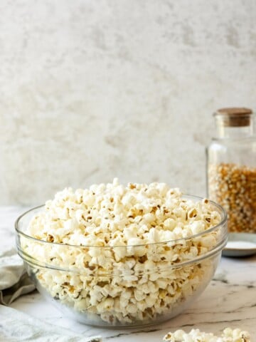 popcorn in glass bowl with marble background