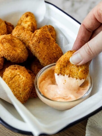 Air fryer chicken nuggets dipped in mayo