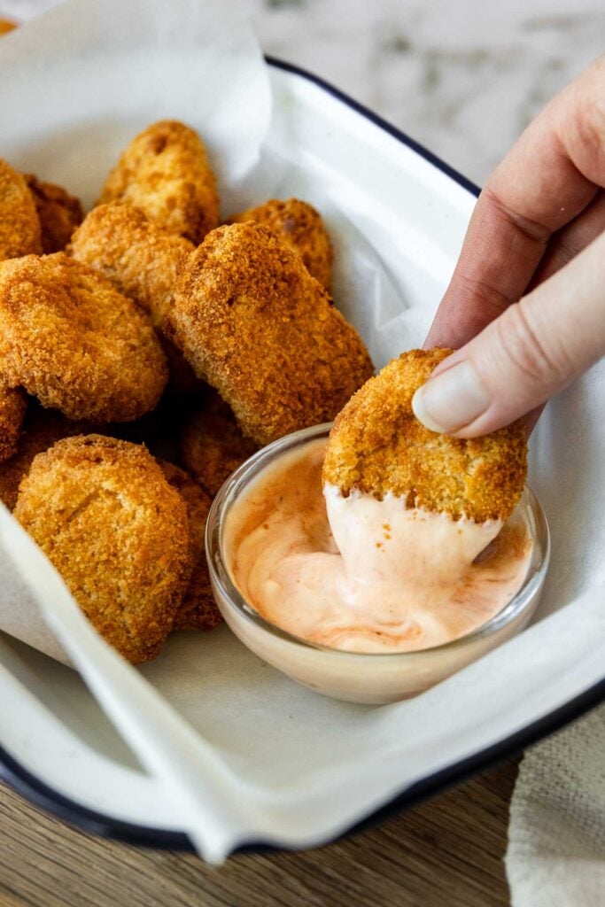Air fryer chicken nuggets dipped in mayo