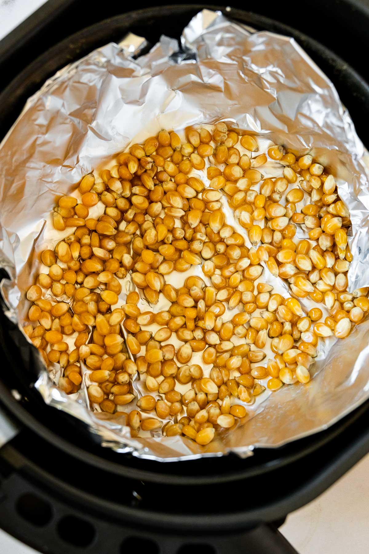 Popcorn kernels on foil in Air fryer
