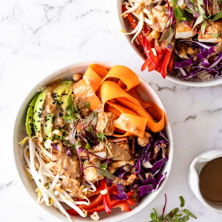 white bowls filled with dragon bowl ingredients