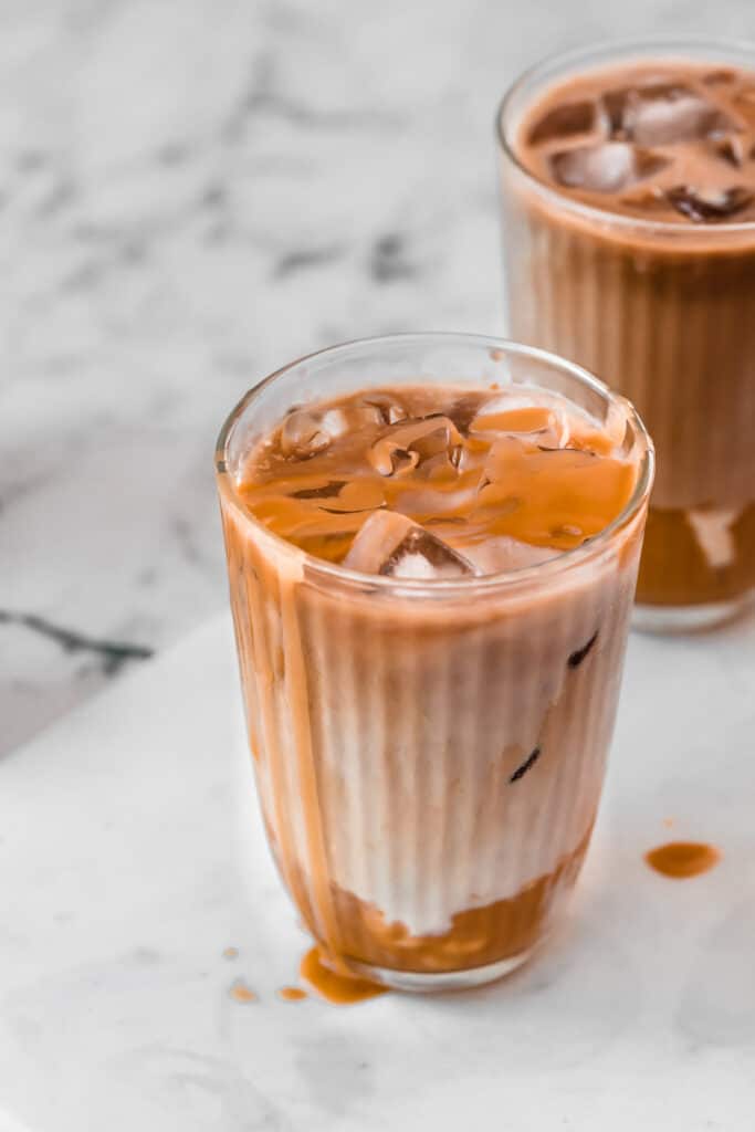 iced caramel latte on marble board