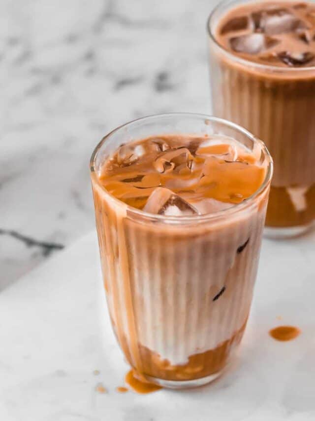 Caramel Iced Mocha Latte in a glass with a caramel drizzle.
