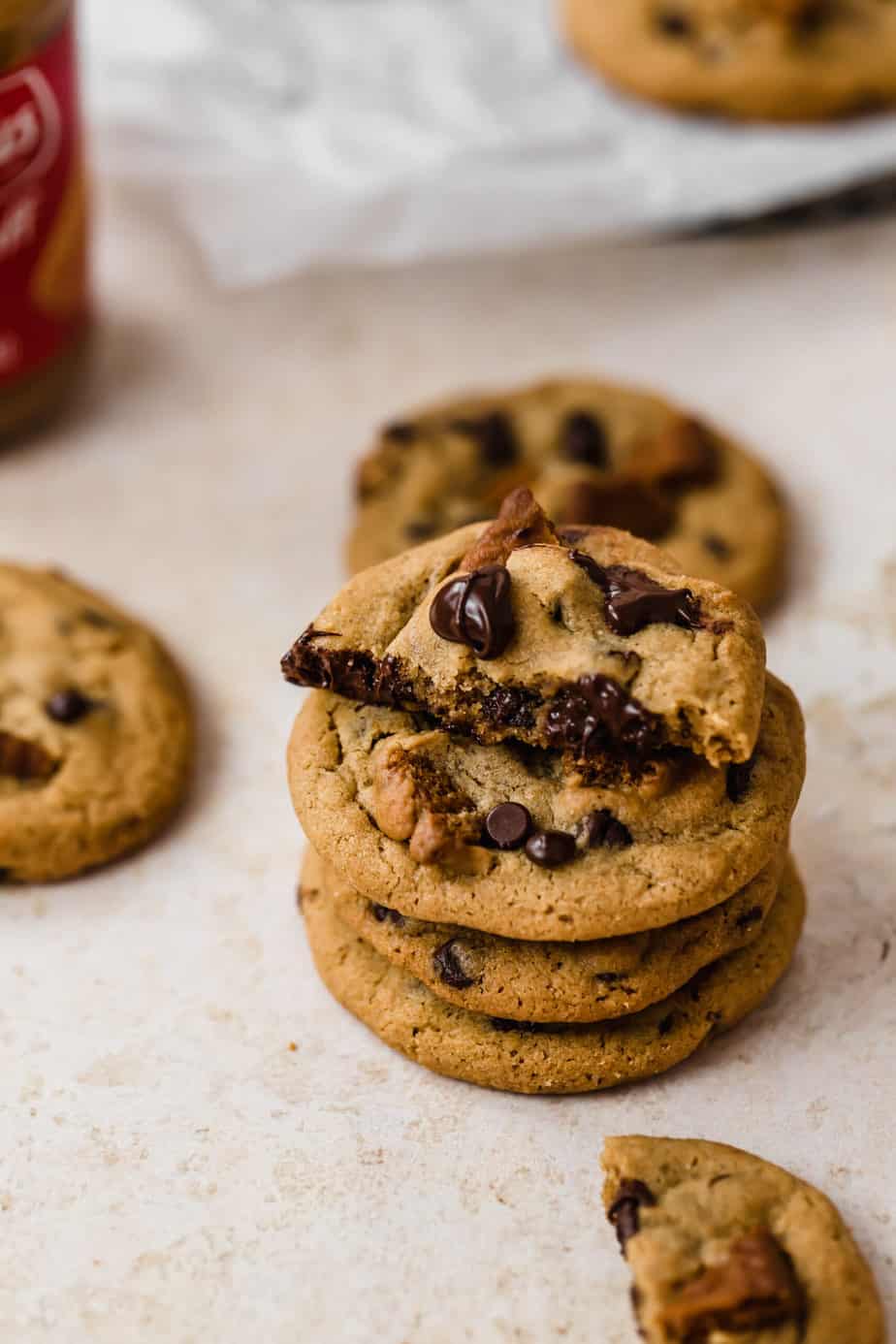 stacked biscoff butter cookies with biscoff speculoos spread in background