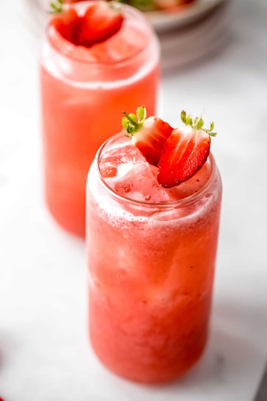 agua de fresa topped with fresh strawberries 
