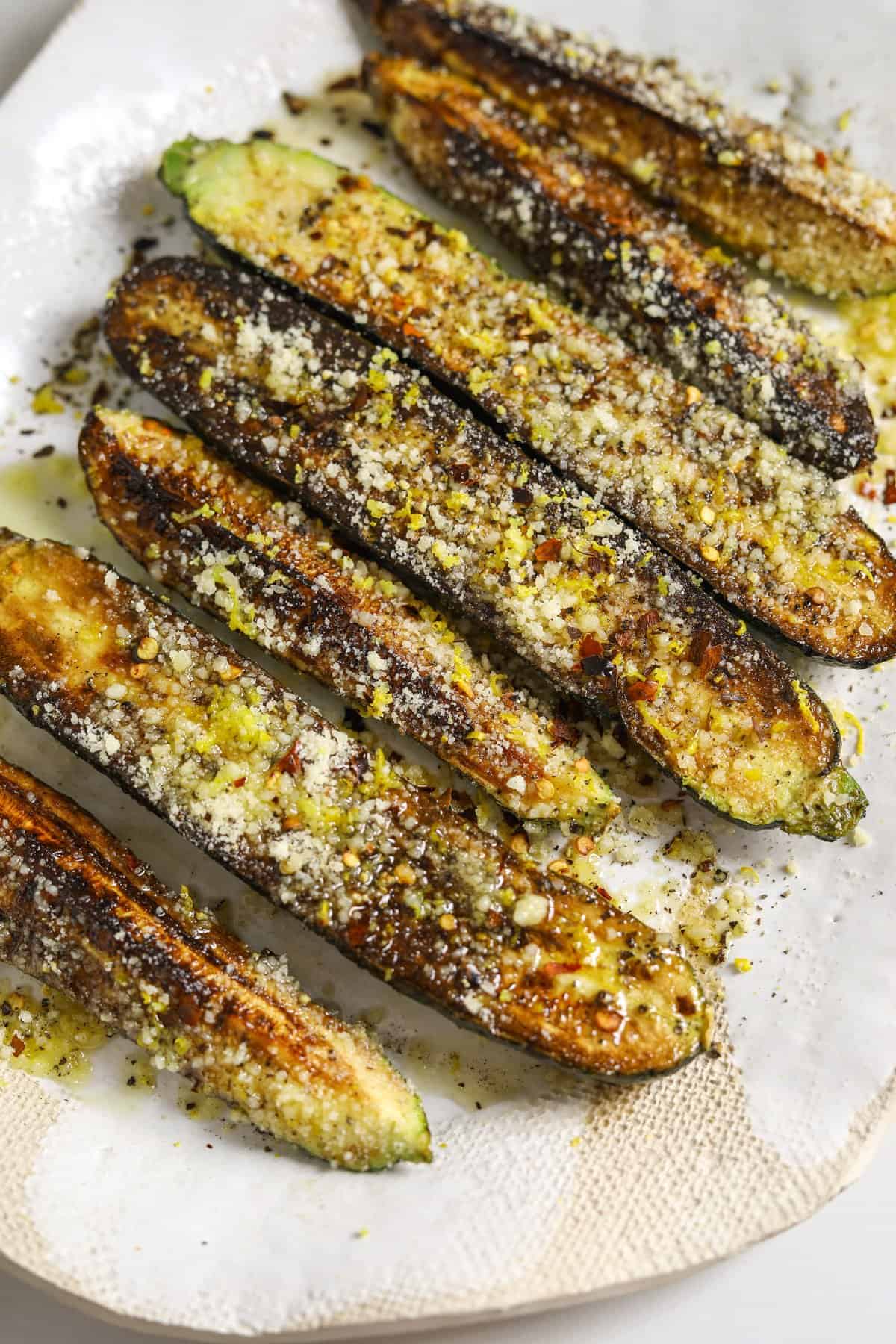 charred zucchini on white plate