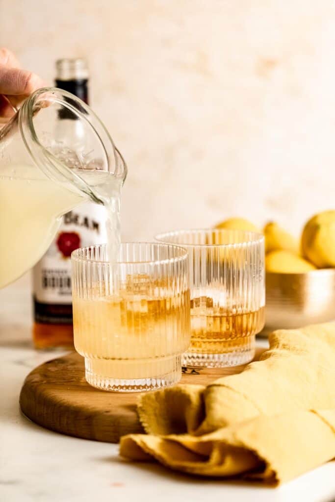 topping bourbon with homemade lemonade
