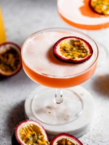 pornstar martini's topped with halved passionfruit