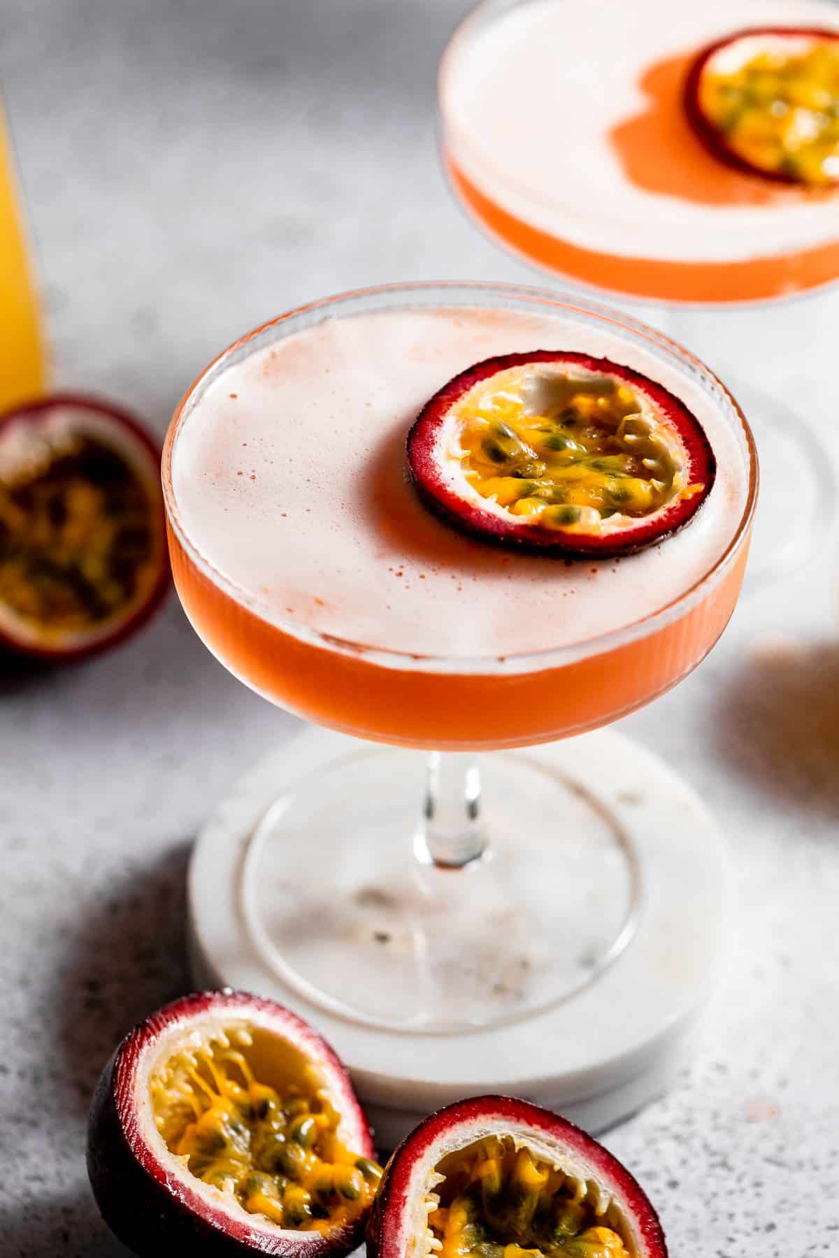 pornstar martini's topped with halved passionfruit