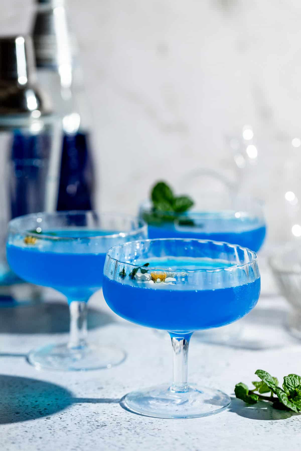 blue lagoon drink on grey background