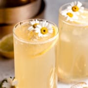 lynchburg lemonade in tall glasses with fresh white flowers